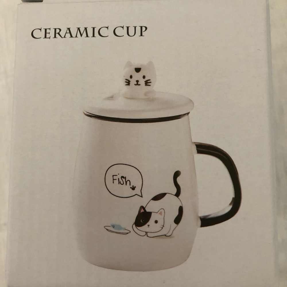 Ceramic cup with spoon